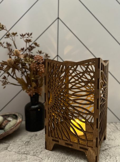 Laser cut wood lanter featuring a sunflower design